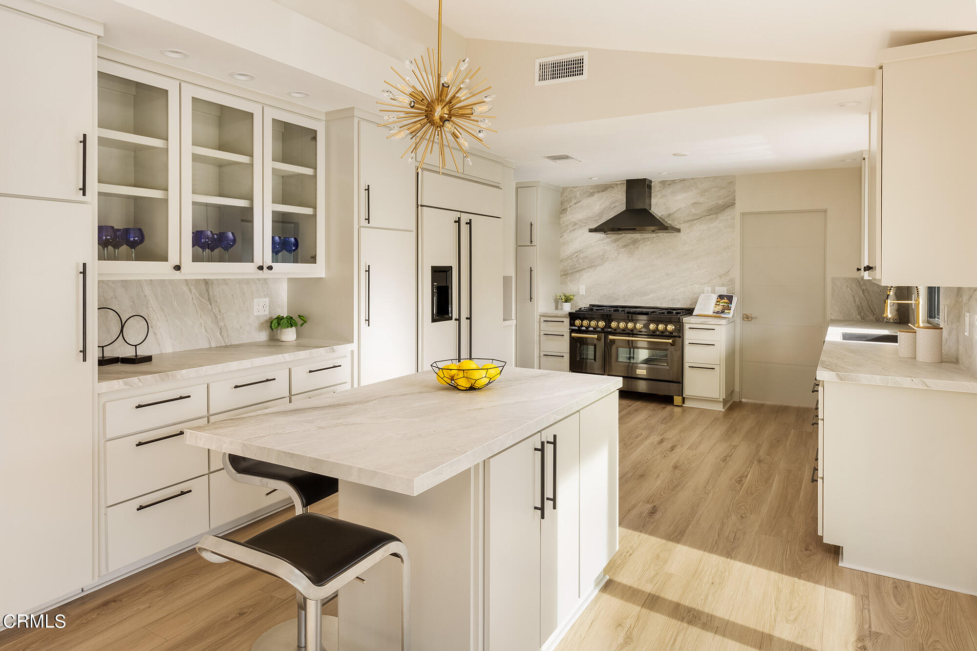 71817 Sahara Road Rancho Mirage, CA 92270 - Photo 8 of 25 a kitchen that has a cabinets and a stove