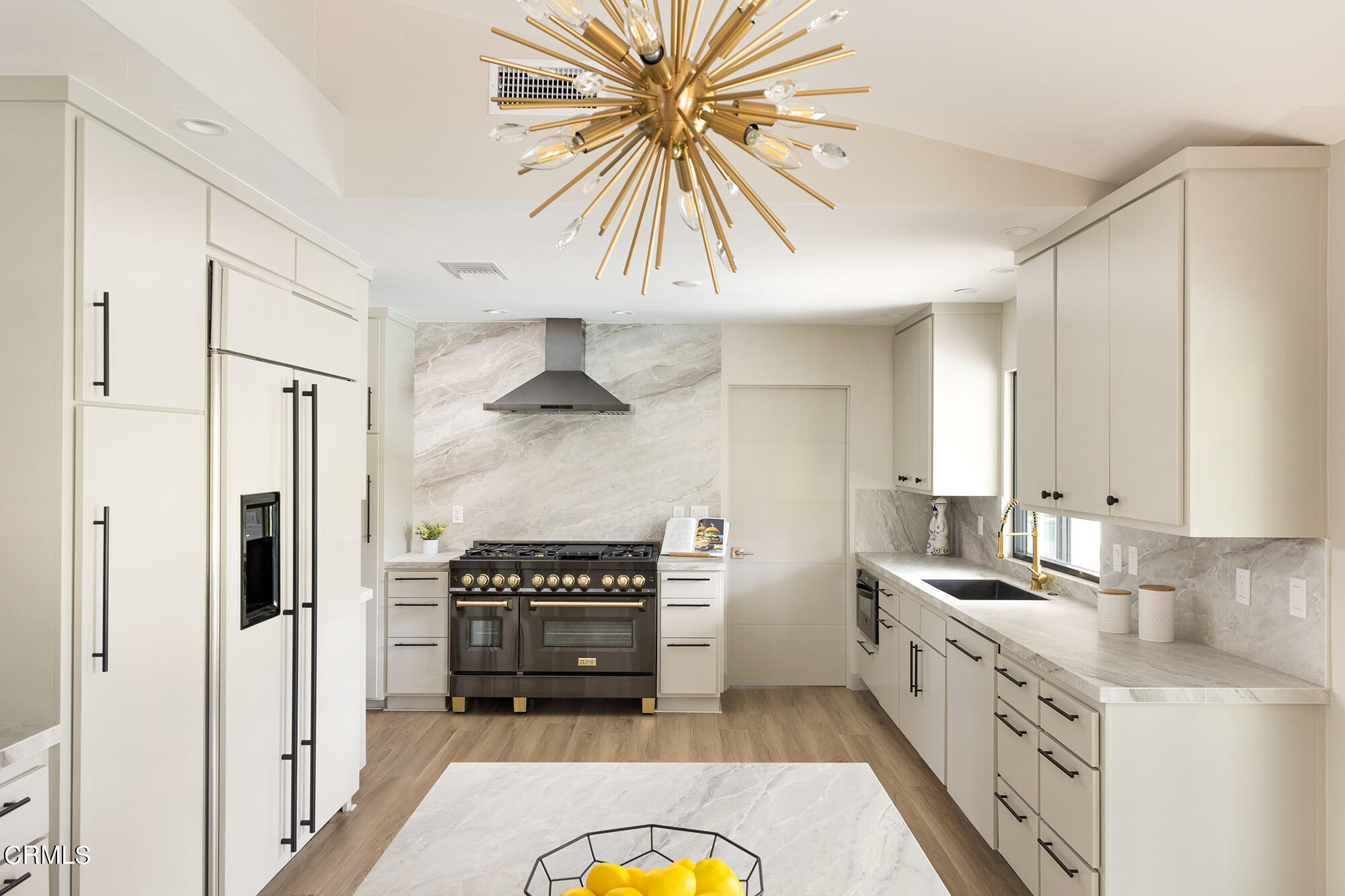 71817 Sahara Road Rancho Mirage, CA 92270 - Photo 9 of 25 a kitchen with a sink appliances and cabinets