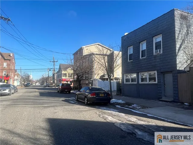 a cars parked in front of a building