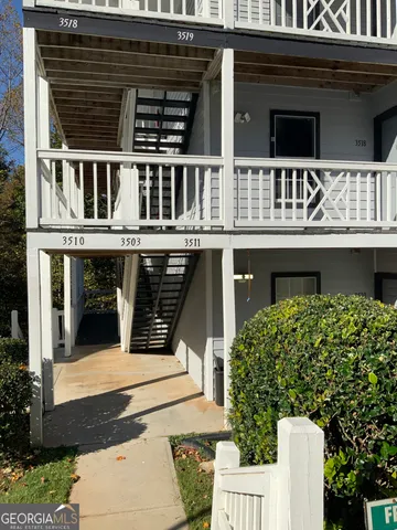 a view of a house with large windows
