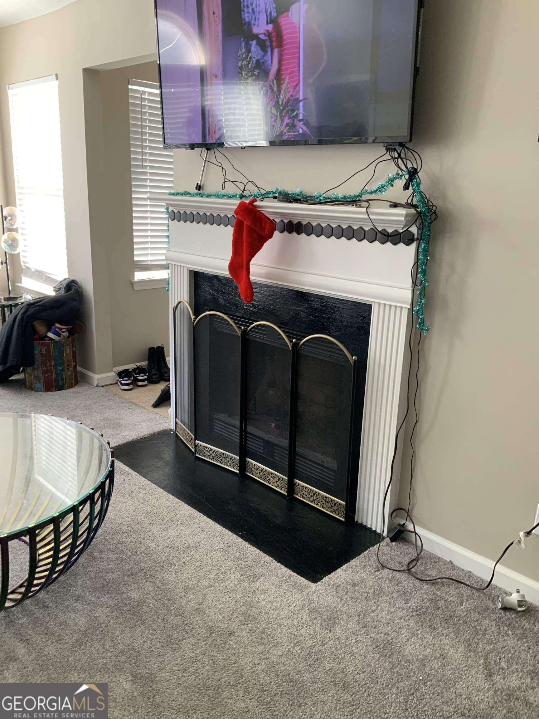 3526 Shepherds Path, Unit 1 Decatur, GA 30034 - Photo 22 of 26 a bed sitting in a bedroom next to a window