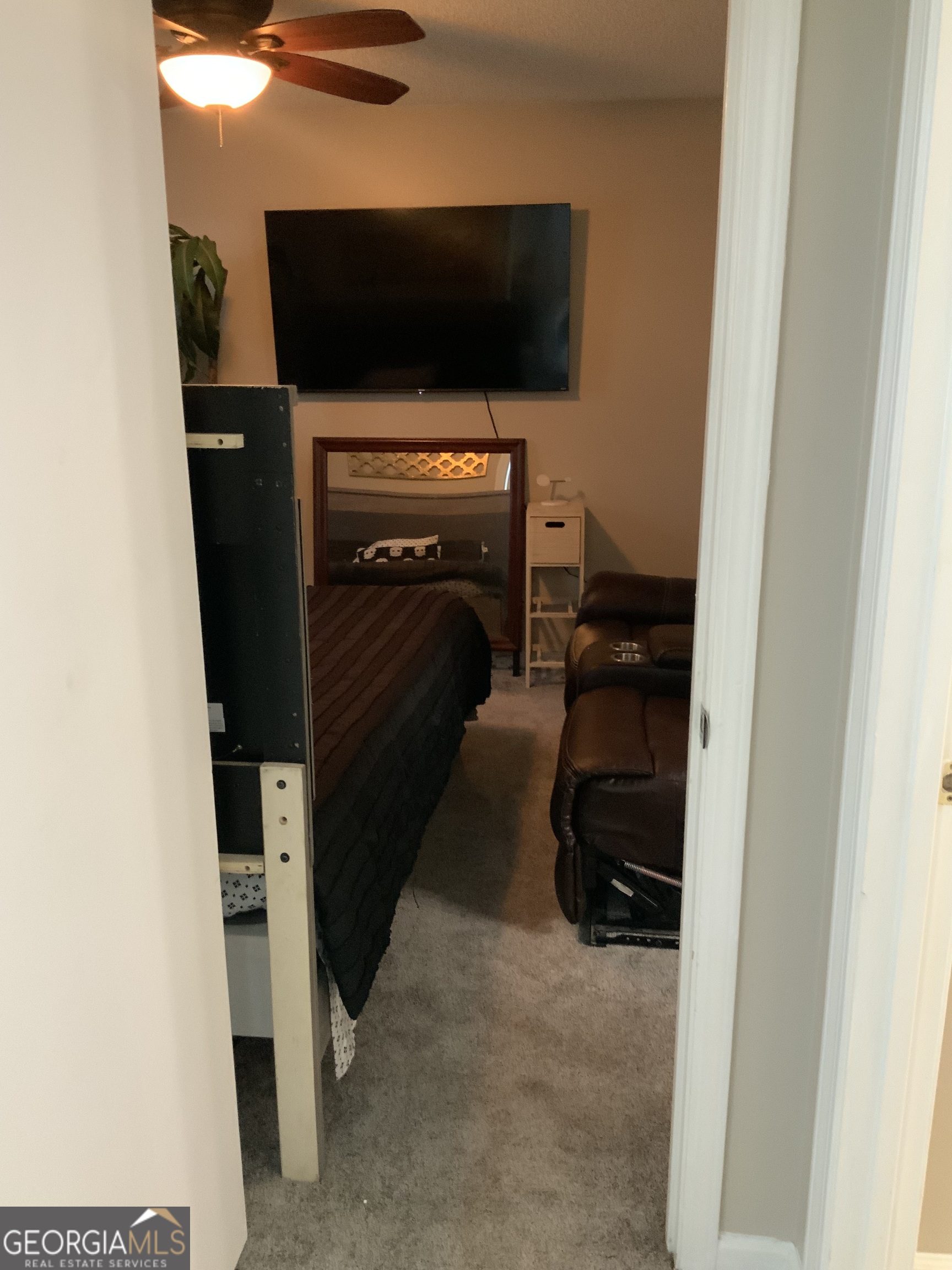 3526 Shepherds Path, Unit 1 Decatur, GA 30034 - Photo 25 of 26 a living room with furniture and a flat screen tv