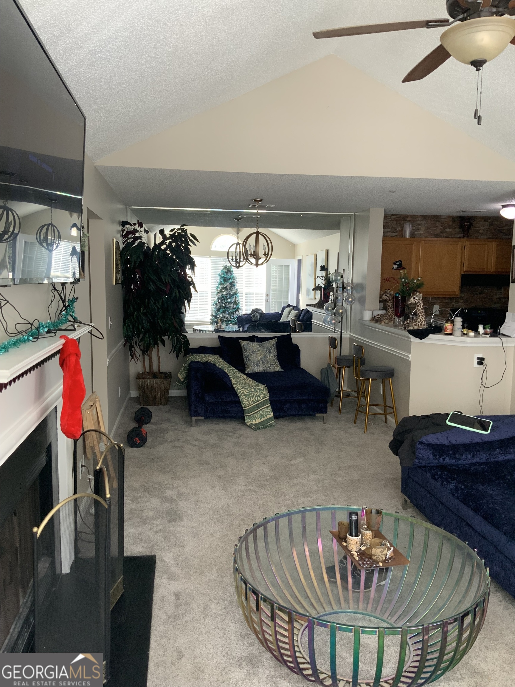 3526 Shepherds Path, Unit 1 Decatur, GA 30034 - Photo 5 of 26 a living room with furniture a flat screen tv and a large window