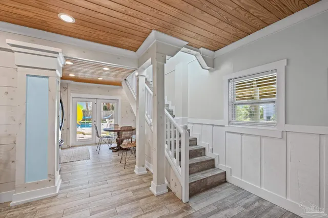 a bedroom with a bed and night stand