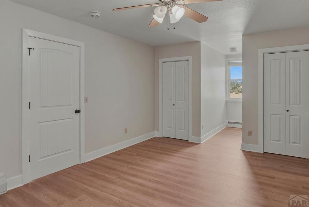 23360 Monarch Road Aguilar, CO 81020 - Photo 28 of 52 a view of an empty room with wooden floor