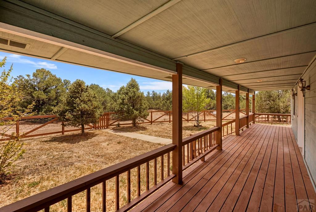 23360 Monarch Road Aguilar, CO 81020 - Photo 46 of 52 a view of a balcony with wooden floor