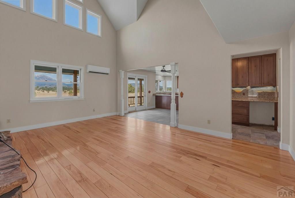 23360 Monarch Road Aguilar, CO 81020 - Photo 7 of 52 a view of empty room with kitchen and window