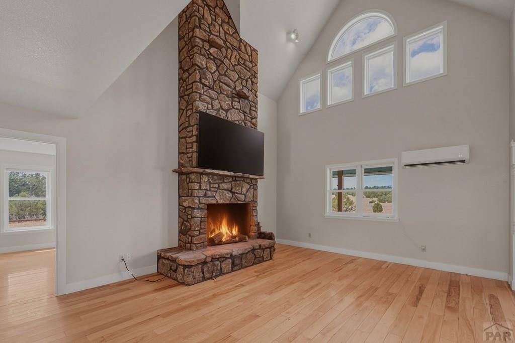 23360 Monarch Road Aguilar, CO 81020 - Photo 9 of 52 a living room with furniture and a fireplace
