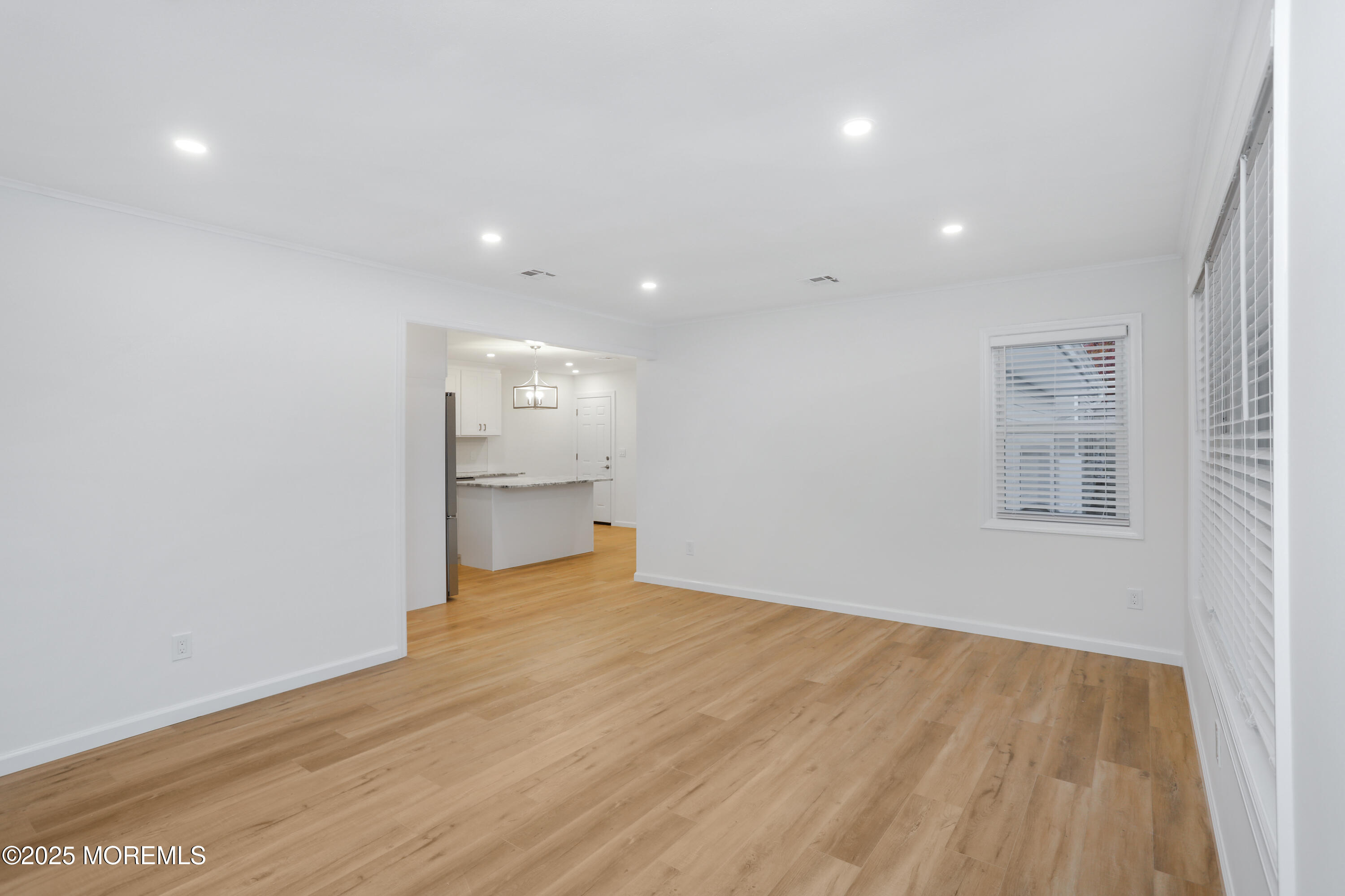 2401 Mallow Street Point Pleasant, NJ 08742 - Photo 4 of 20 a view of a kitchen with a sink and a window