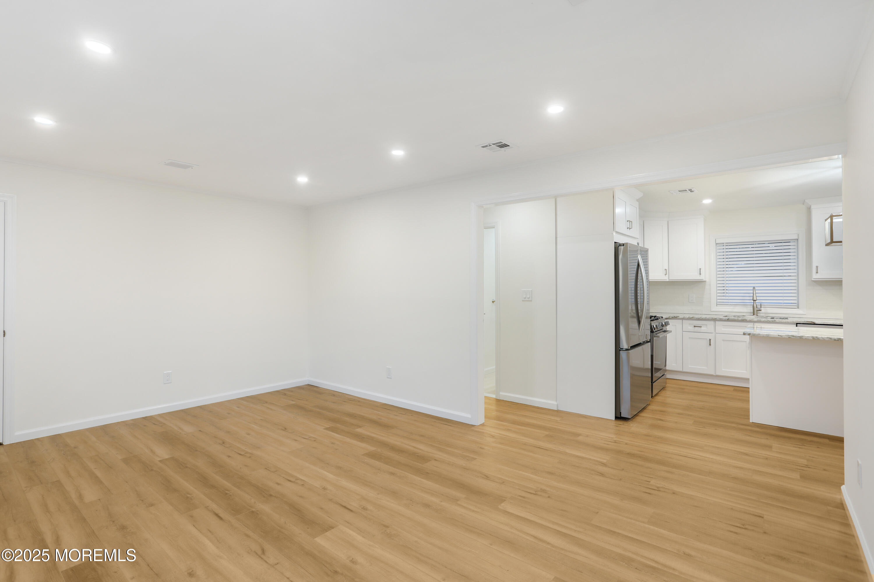 2401 Mallow Street Point Pleasant, NJ 08742 - Photo 6 of 20 a view of kitchen with wooden floor