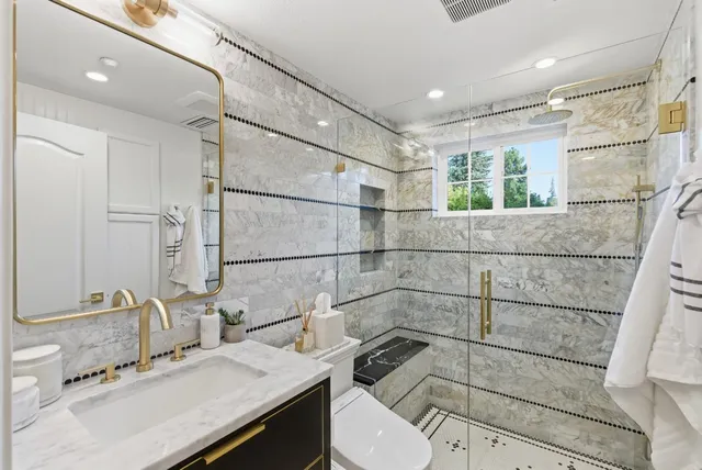 a view of a chairs and table in backyard