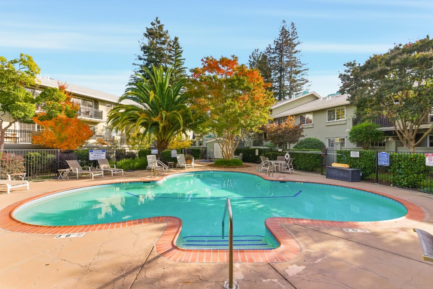 20 Willow Road, Unit 7 Menlo Park, CA 94025 - Photo 20 of 24 a view of a house with a swimming pool