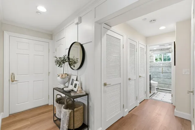 a view of a hallway with seating area