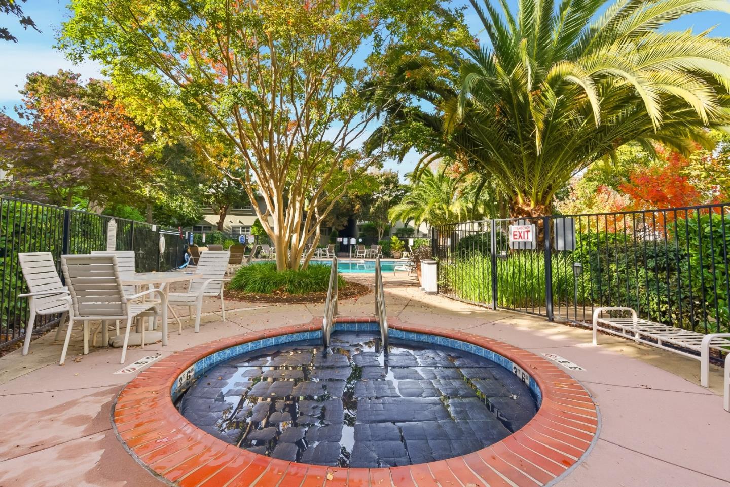 20 Willow Road, Unit 7 Menlo Park, CA 94025 - Photo 21 of 24 a view of a swimming pool with a patio
