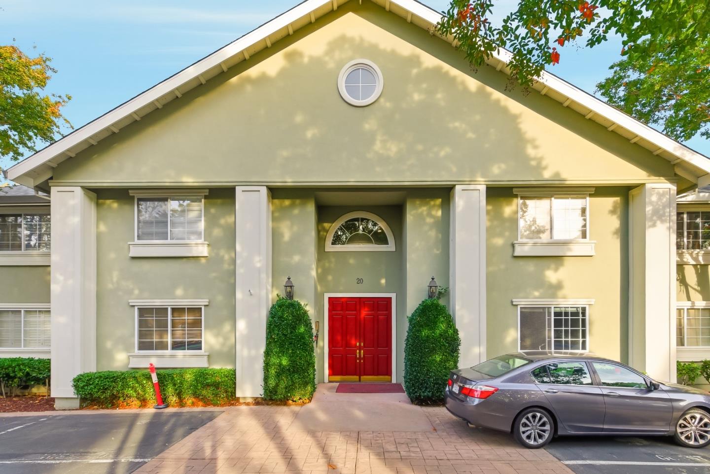 20 Willow Road, Unit 7 Menlo Park, CA 94025 - Photo 24 of 24 a car parked in front of a house