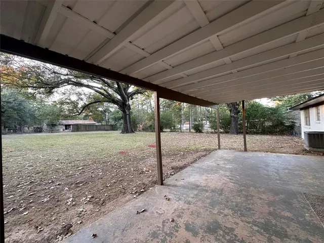 a view of a yard with porch