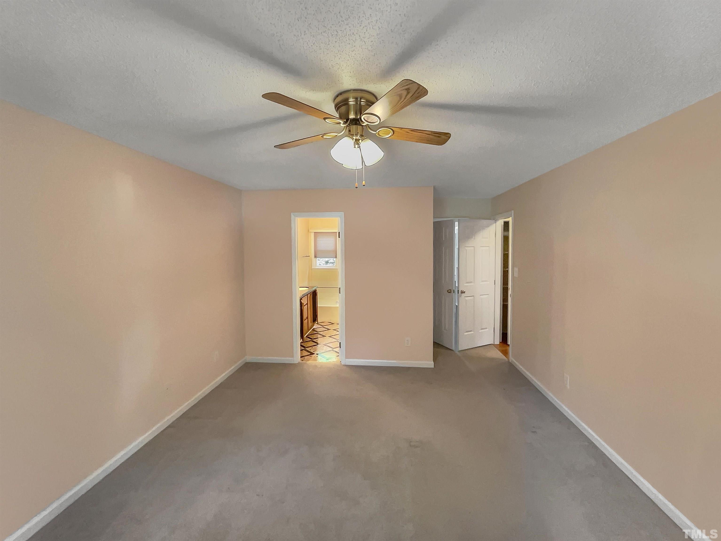 5225 Knightsbridge Way Raleigh, NC 27604 - Photo 15 of 21 a view of a livingroom with a ceiling fan and window