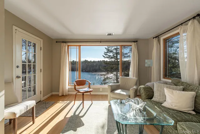 a view of a glass door and a window