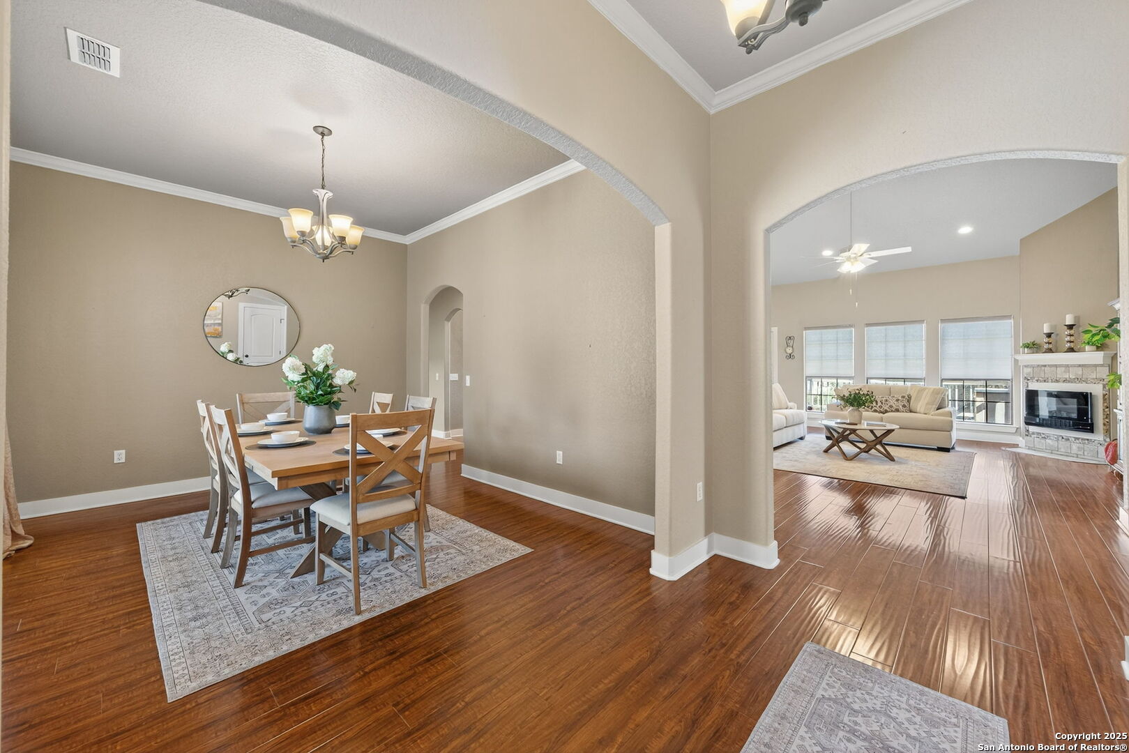 905 Cypress Pass Road Spring Branch, TX 78070 - Photo 16 of 42 a view of a dining room with furniture and wooden floor