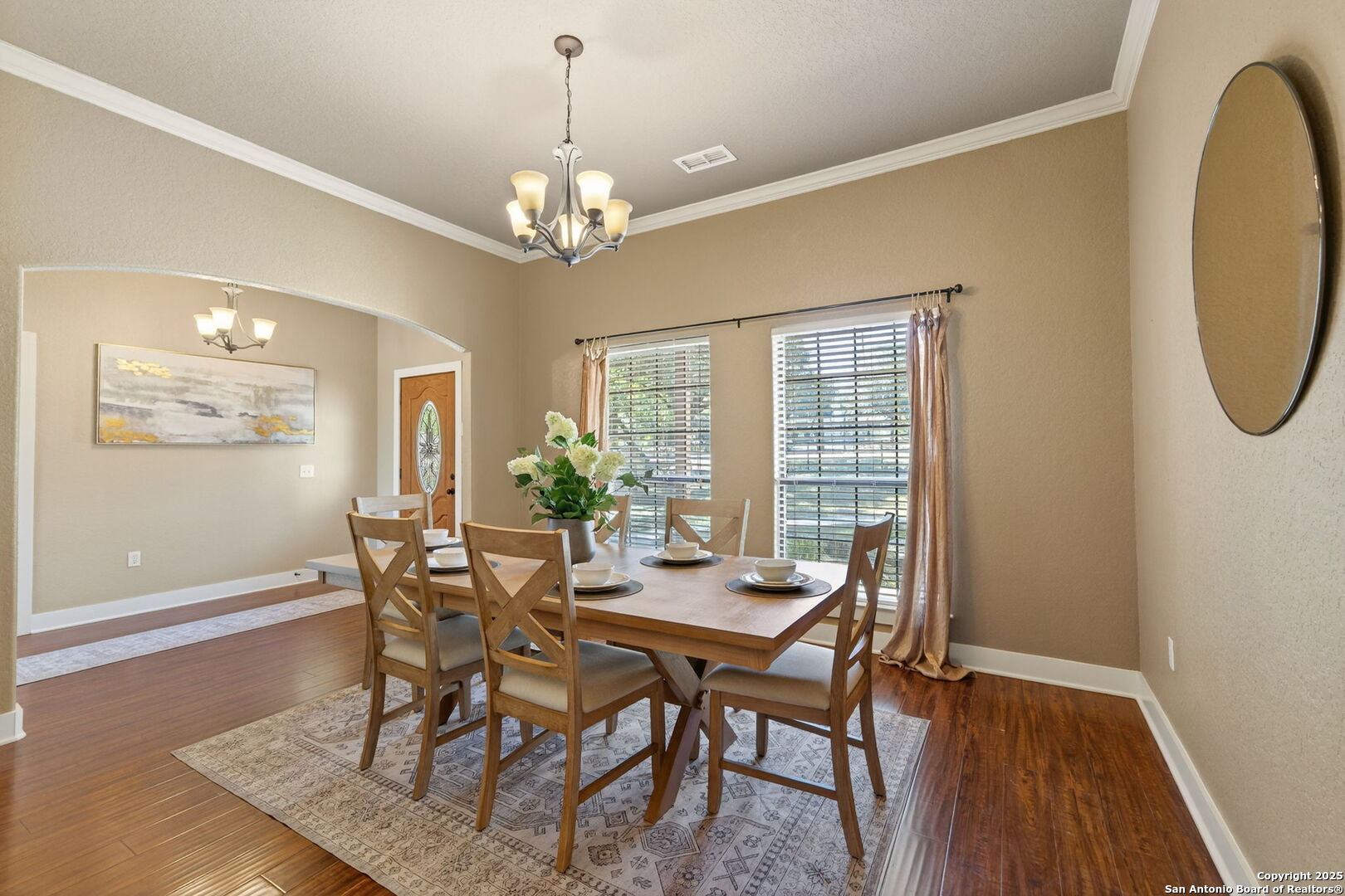 905 Cypress Pass Road Spring Branch, TX 78070 - Photo 17 of 42 a view of a dining room with furniture and wooden floor