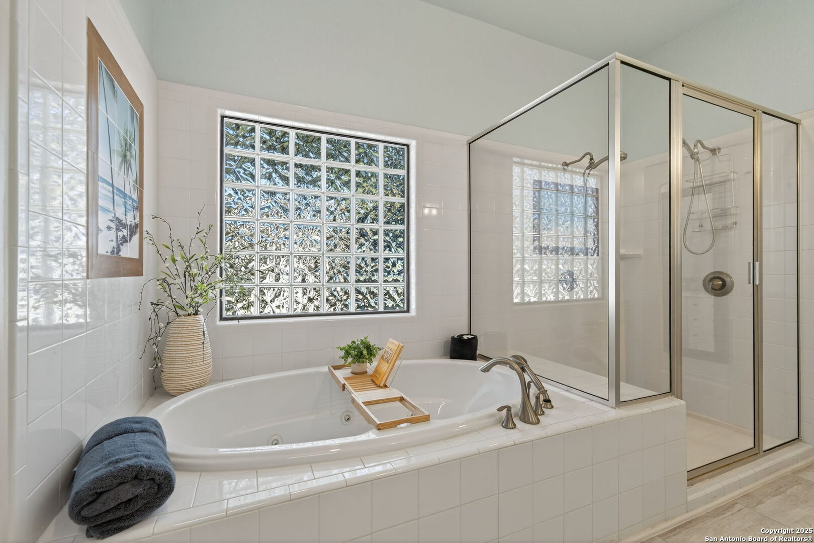 905 Cypress Pass Road Spring Branch, TX 78070 - Photo 23 of 42 a bathroom with a tub a sink and a window