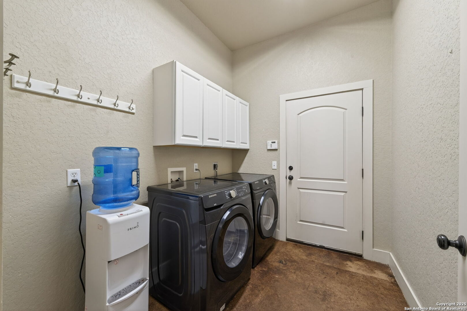 905 Cypress Pass Road Spring Branch, TX 78070 - Photo 29 of 42 a utility room with dryer and washer