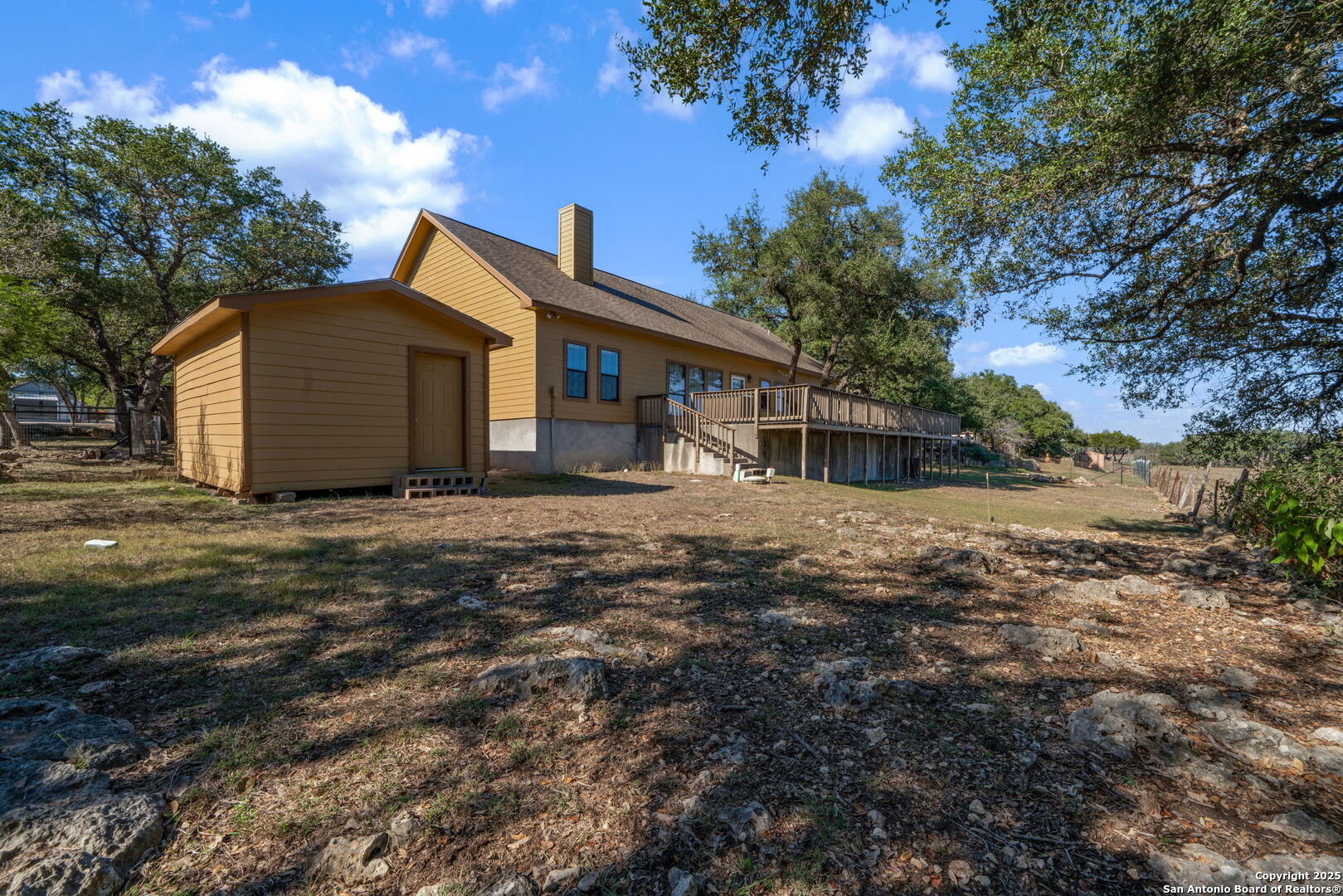 905 Cypress Pass Road Spring Branch, TX 78070 - Photo 33 of 42 a front view of a house with a yard