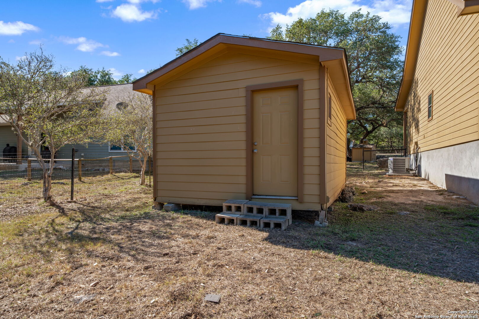 905 Cypress Pass Road Spring Branch, TX 78070 - Photo 34 of 42 a front view of a house with garden