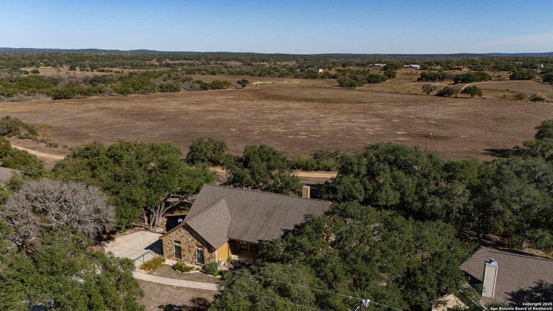 905 Cypress Pass Road Spring Branch, TX 78070 - Photo 35 of 42 an aerial view of residential houses with outdoor space