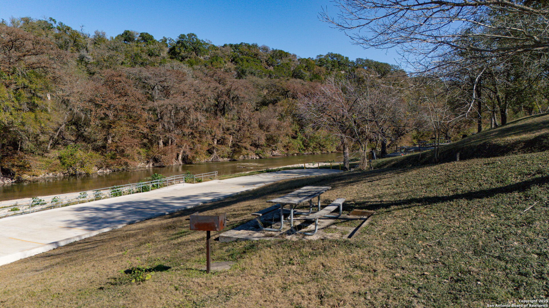 905 Cypress Pass Road Spring Branch, TX 78070 - Photo 38 of 42 a view of a yard with a tree