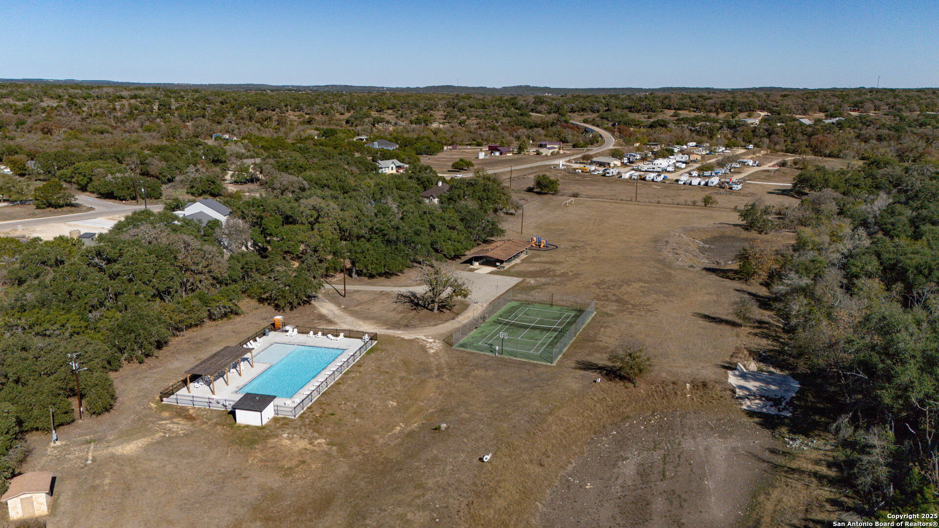 905 Cypress Pass Road Spring Branch, TX 78070 - Photo 40 of 42 an aerial view of residential houses with outdoor space