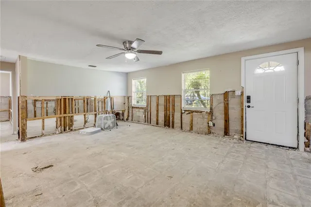 a view of an empty room with a window