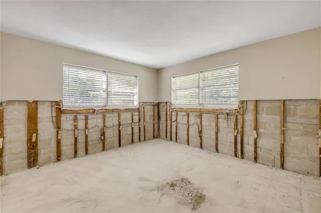 a view of a room with windows