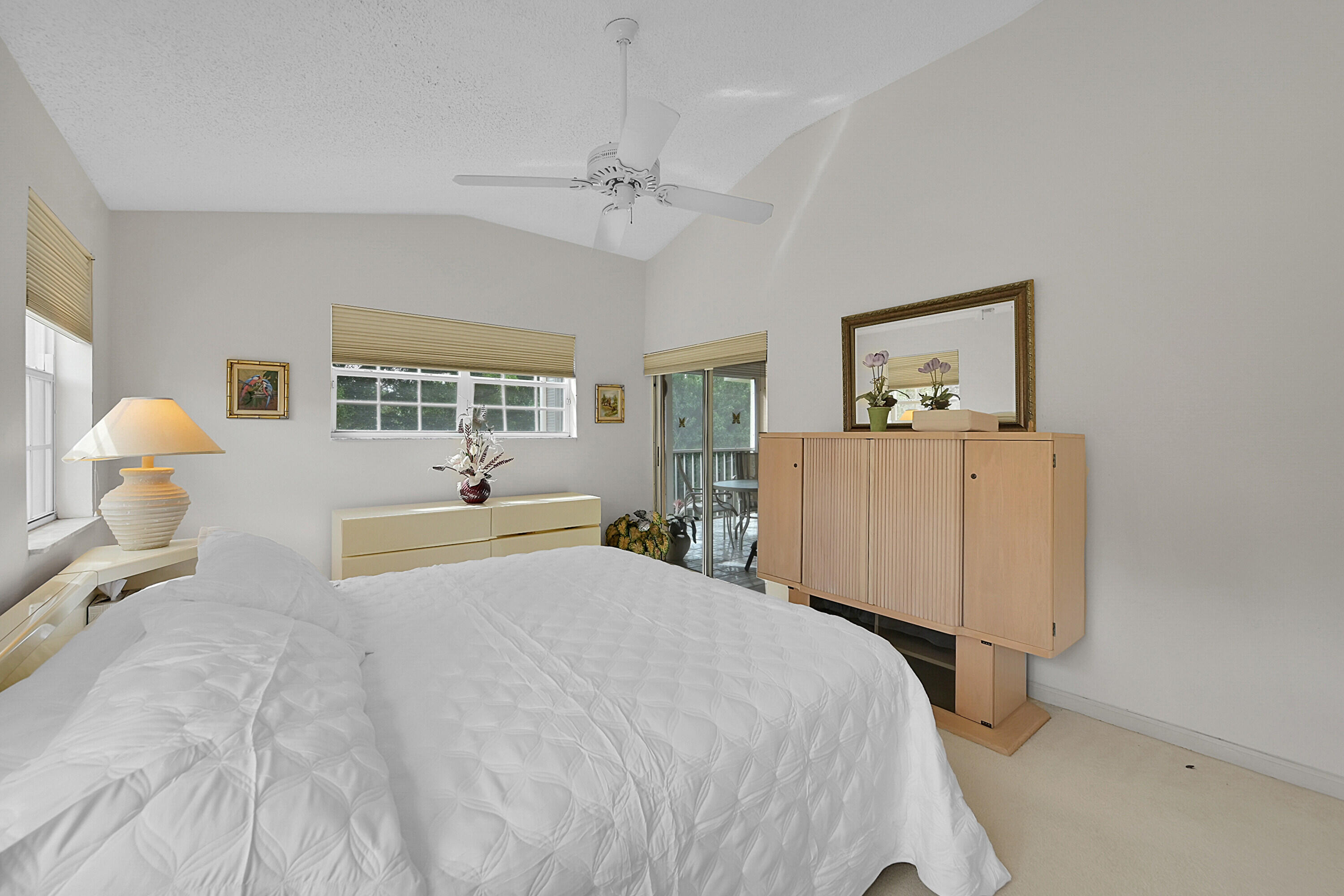 17270 Boca Club Boulevard, Unit 1702 Boca Raton, FL 33487 - Photo 19 of 41 a bedroom with a bed and window