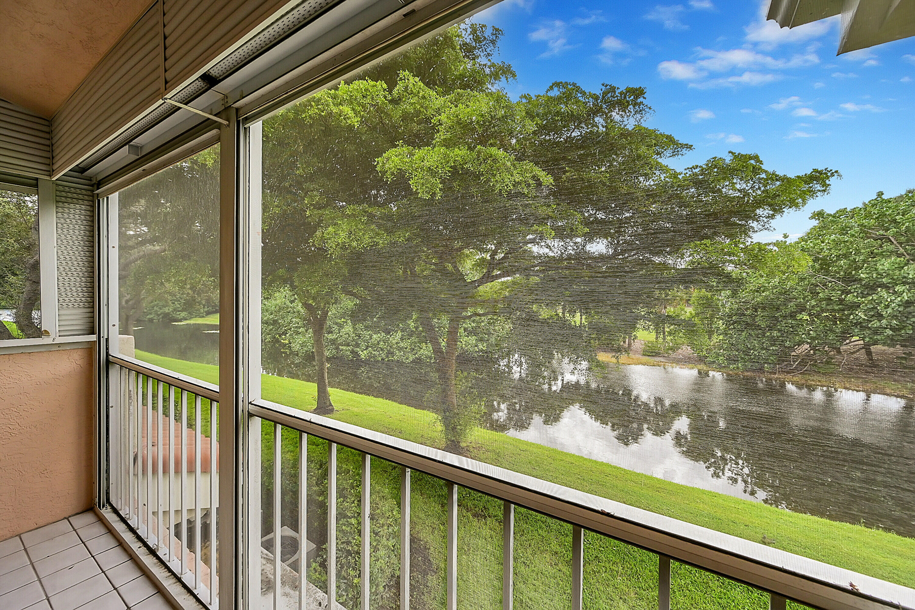 17270 Boca Club Boulevard, Unit 1702 Boca Raton, FL 33487 - Photo 30 of 41 a view of lake from a balcony