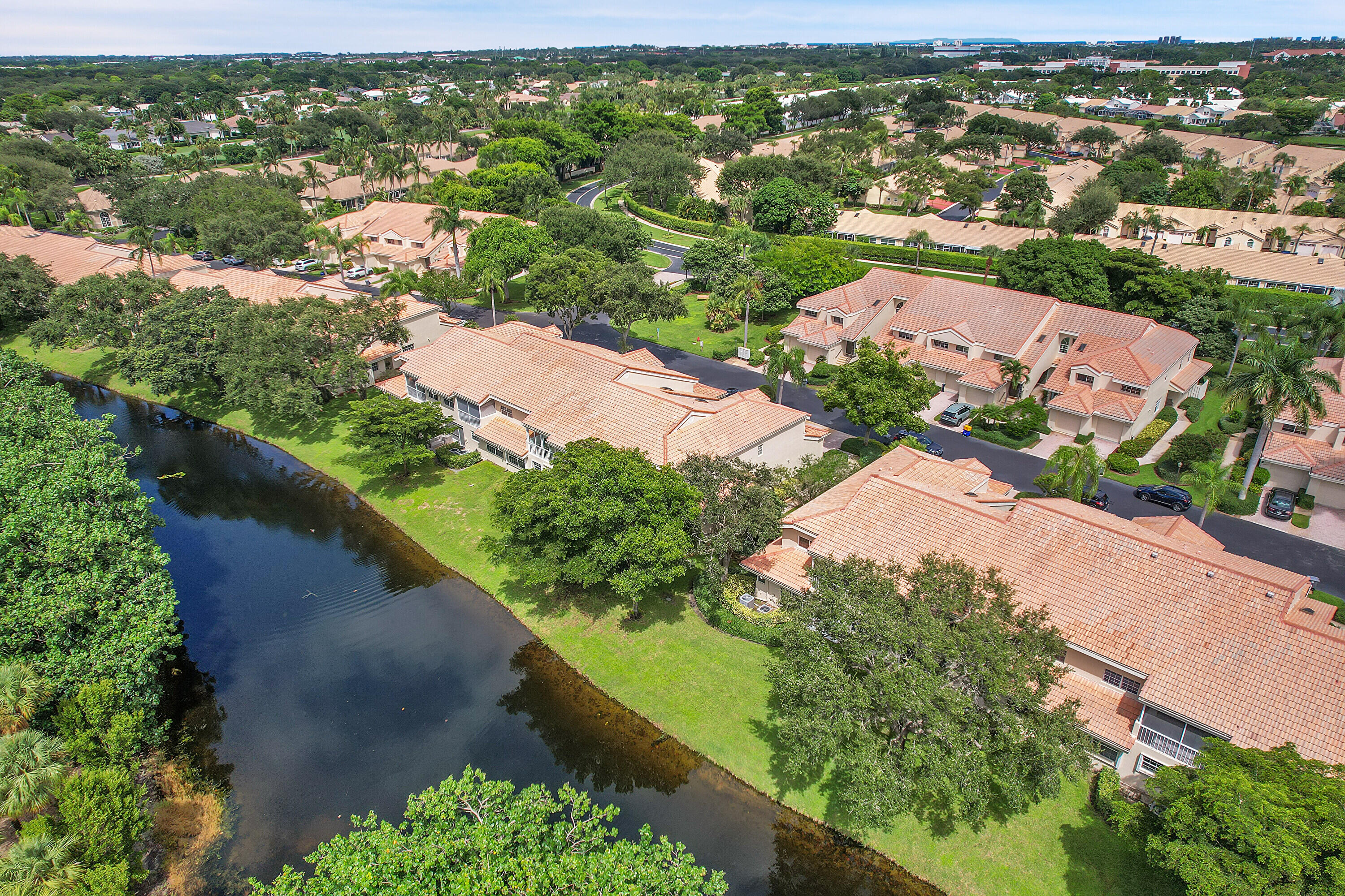 17270 Boca Club Boulevard, Unit 1702 Boca Raton, FL 33487 - Photo 37 of 41 an aerial view of residential houses with outdoor space and river