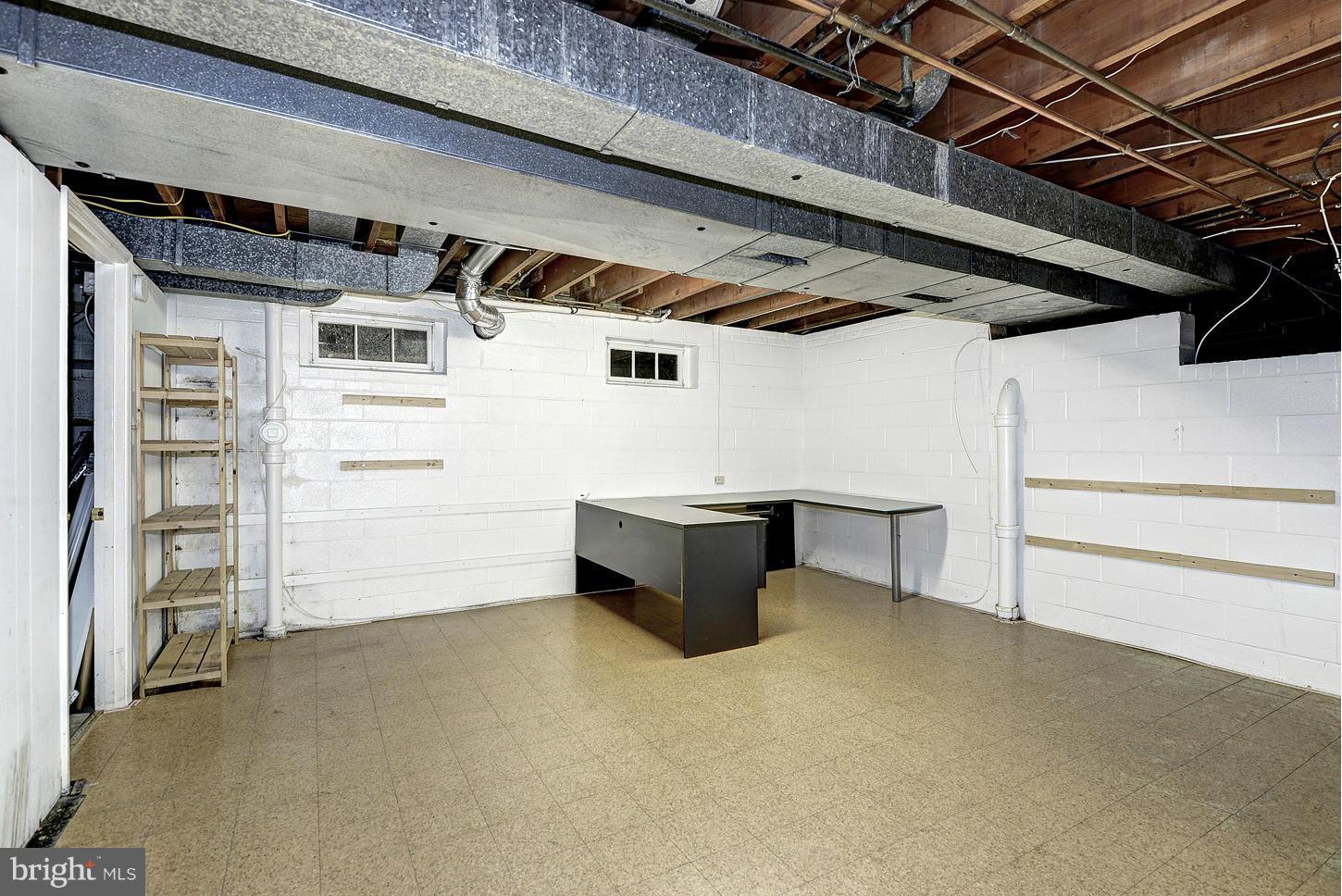 10516 Gainsborough Road Potomac, MD 20854 - Photo 25 of 30 BASEMENT DESK AND STORAGE