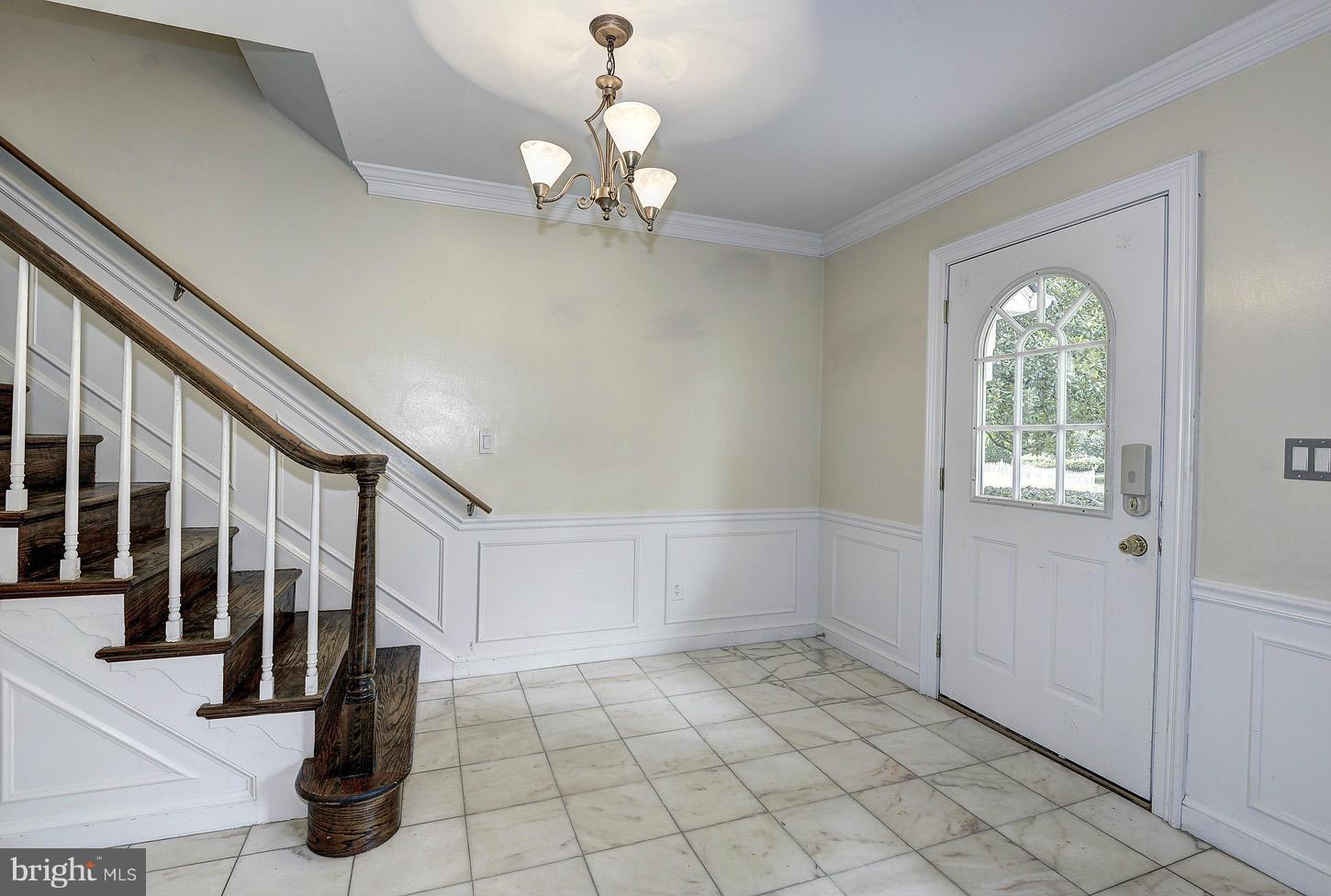 10516 Gainsborough Road Potomac, MD 20854 - Photo 5 of 30 FOYER TO FRONT DOOR