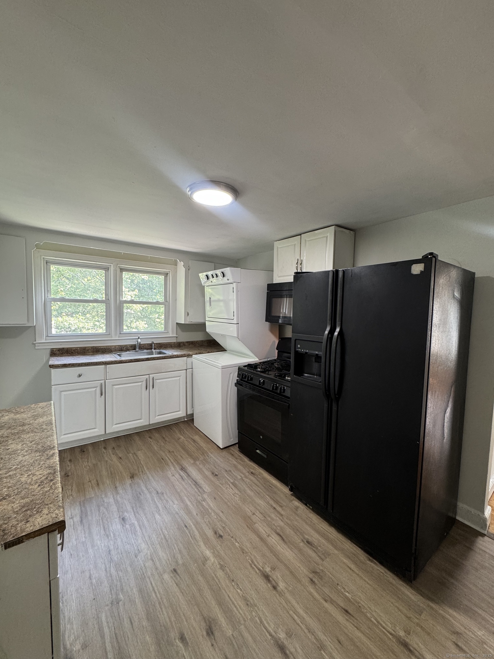 35 Goodyear Street, Unit 2 New Haven, CT 06511 - Photo 5 of 10 a kitchen with a refrigerator and a sink