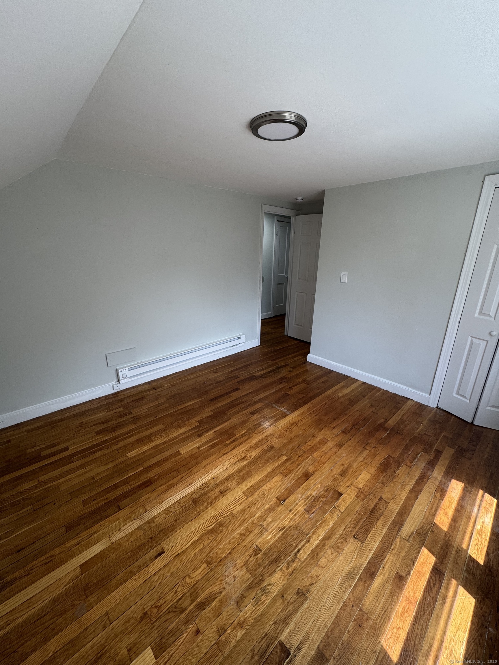 35 Goodyear Street, Unit 2 New Haven, CT 06511 - Photo 9 of 10 a view of empty room with wooden floor