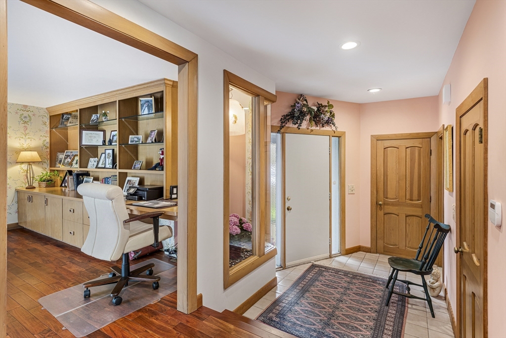 94 Howland Road Westport, MA 02790 - Photo 11 of 33 a view of a livingroom with furniture and workspace