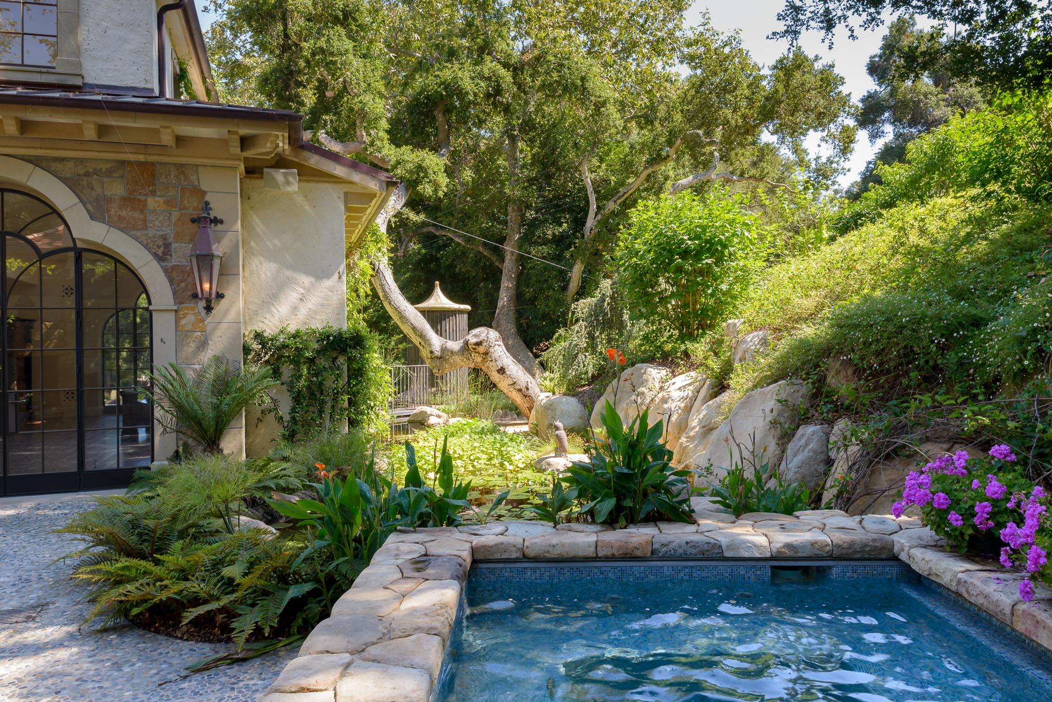 1240 East Valley Road Santa Barbara, CA 93108 - Photo 3 of 11 a view of a garden with plants