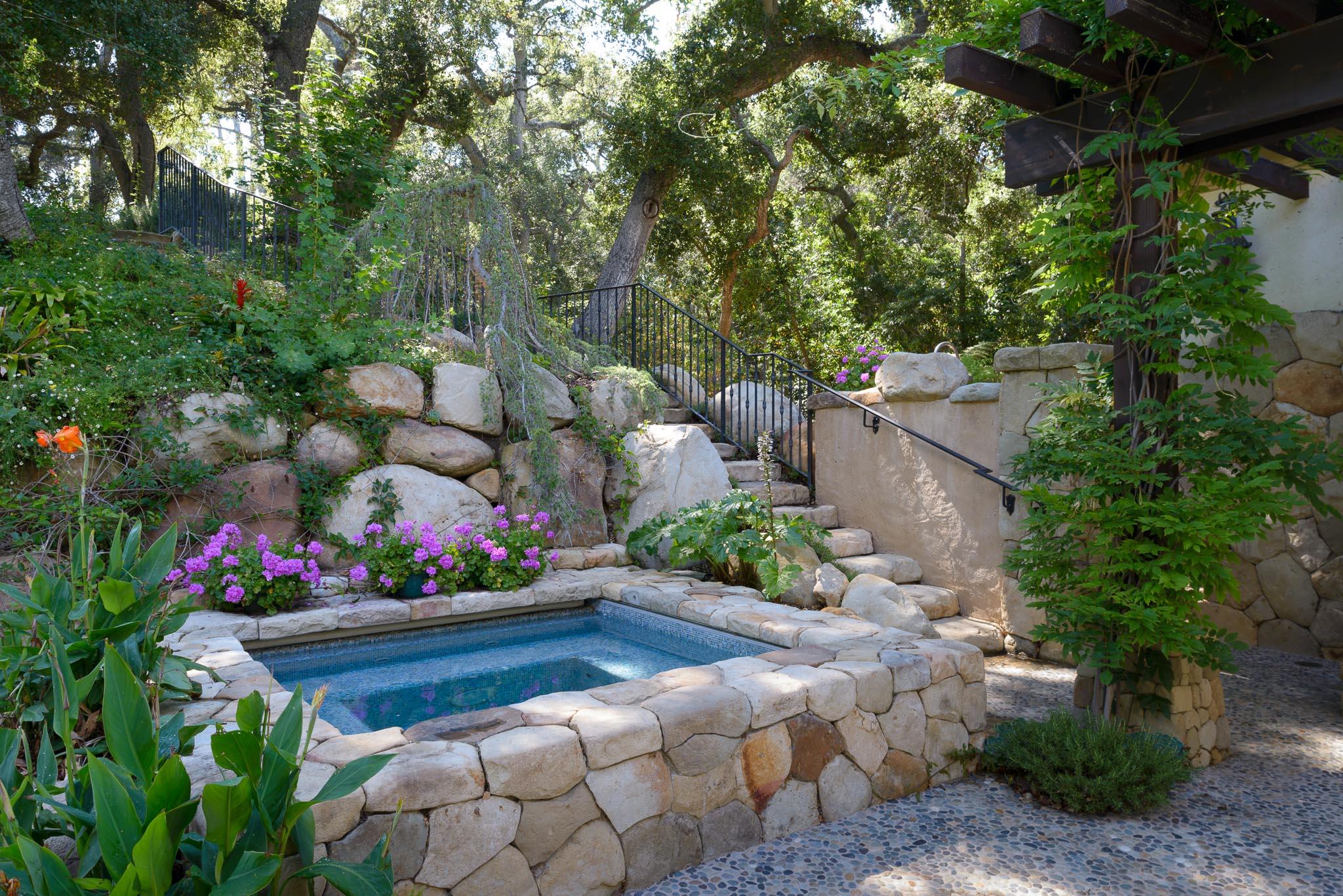 1240 East Valley Road Santa Barbara, CA 93108 - Photo 4 of 11 a view of a garden with flowers