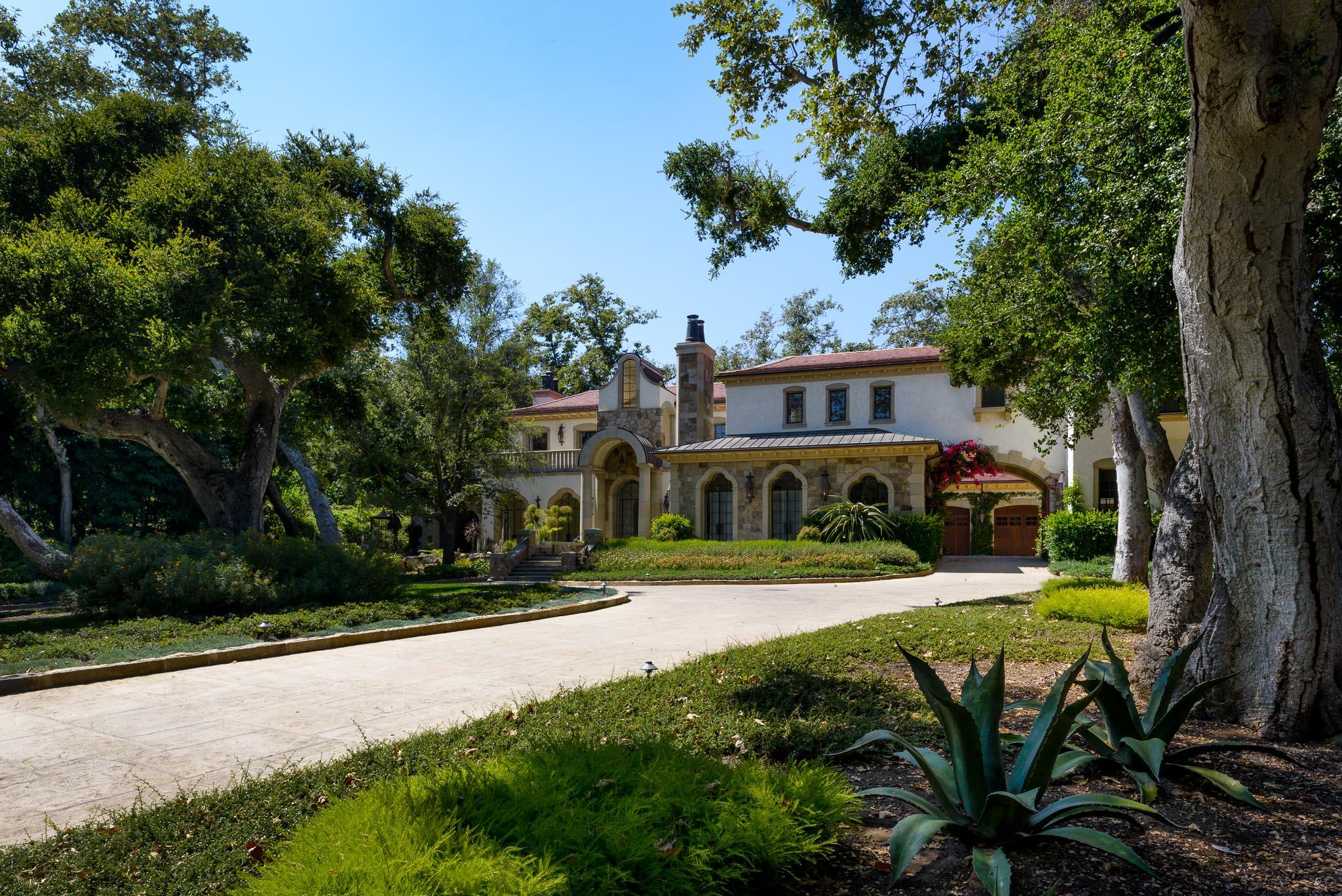 1240 East Valley Road Santa Barbara, CA 93108 - Photo 5 of 11 a view of a house with garden and trees