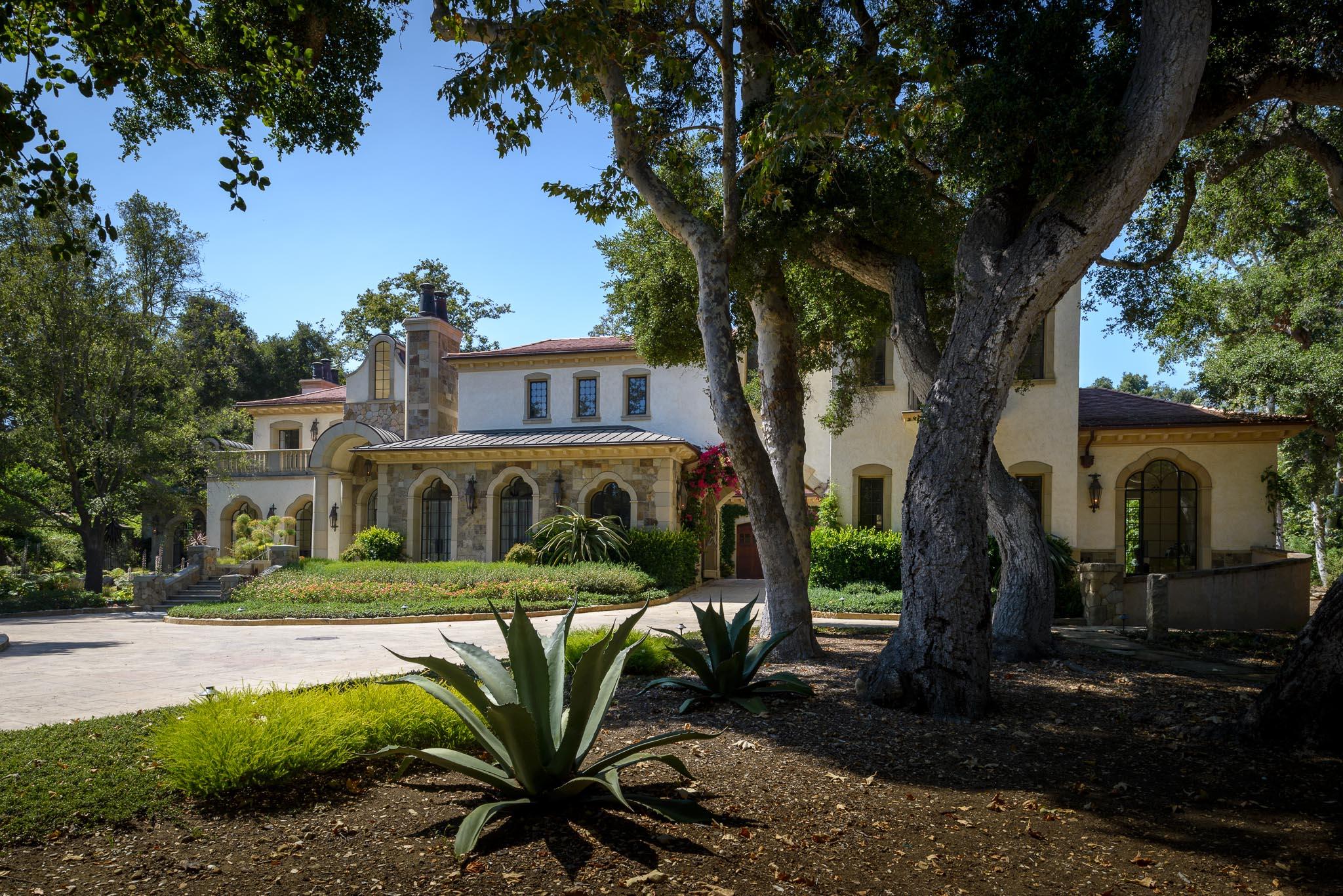1240 East Valley Road Santa Barbara, CA 93108 - Photo 6 of 11 a front view of a house with garden