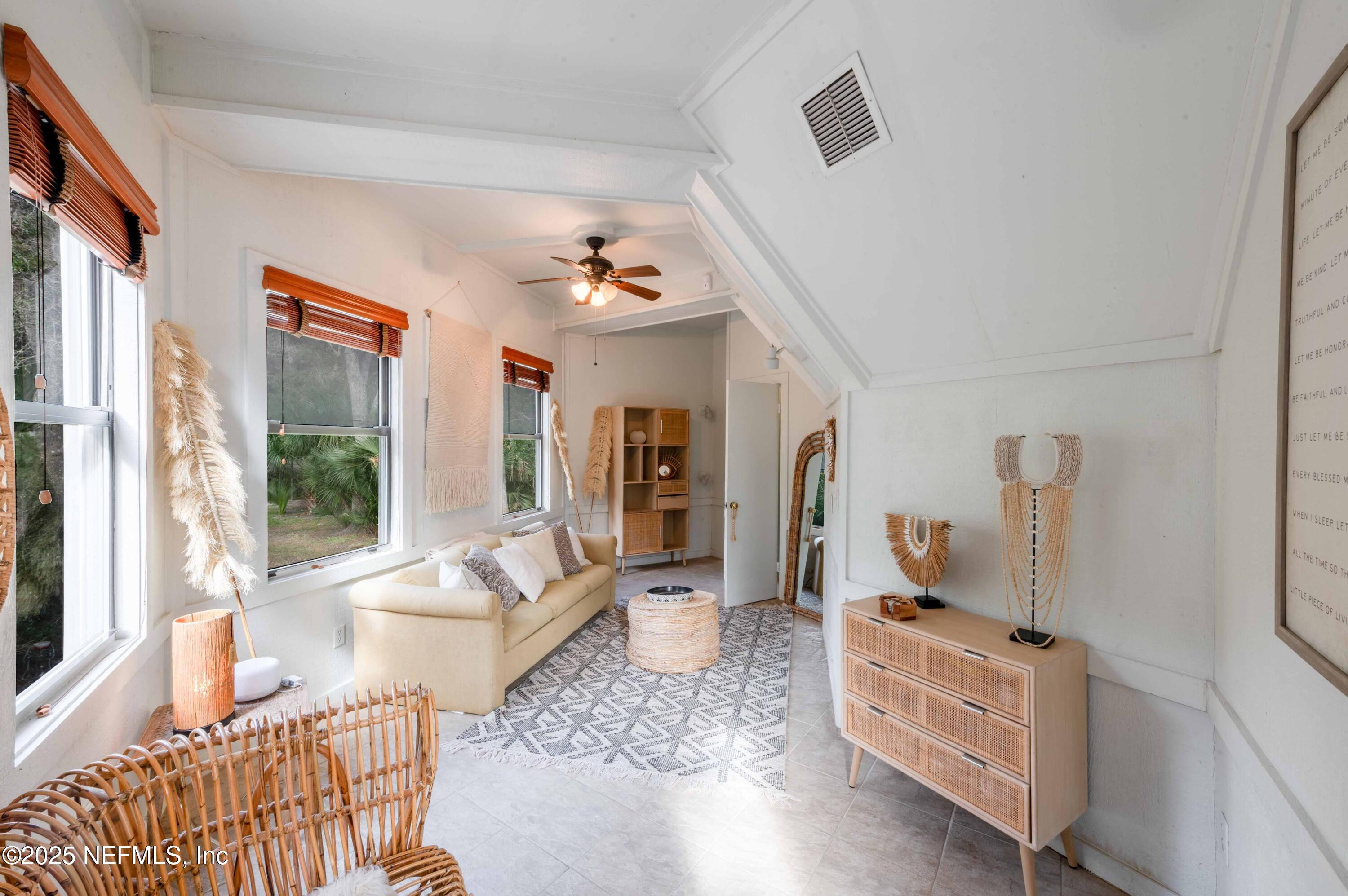 11255 Fort George Road Jacksonville, FL 32226 - Photo 14 of 38 a living room with furniture and wooden floor