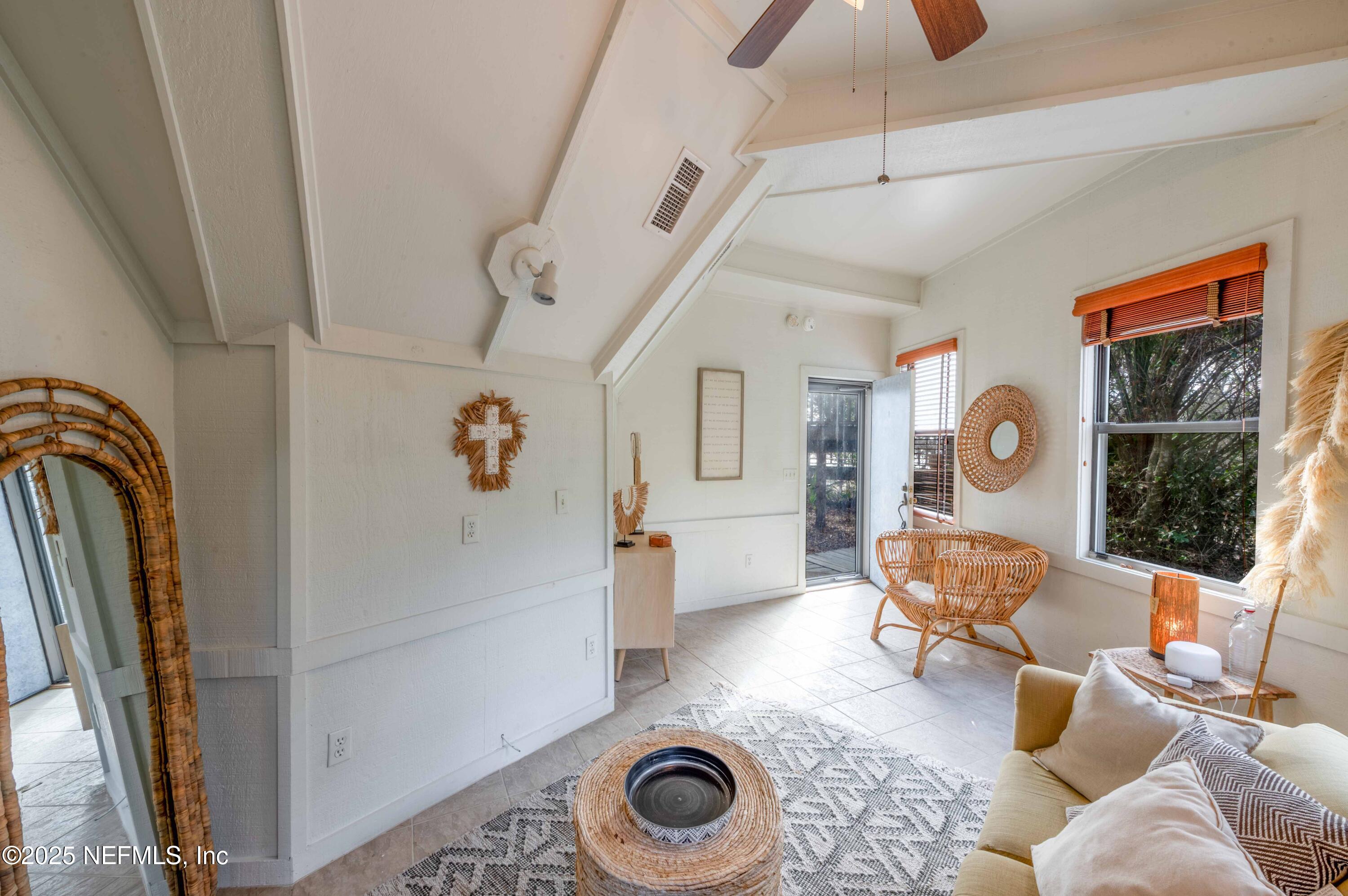 11255 Fort George Road Jacksonville, FL 32226 - Photo 16 of 38 a living room with furniture and a window