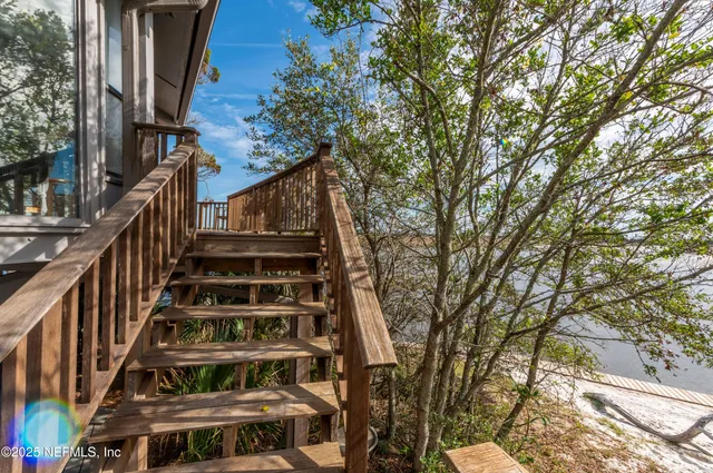 a view of balcony with furniture