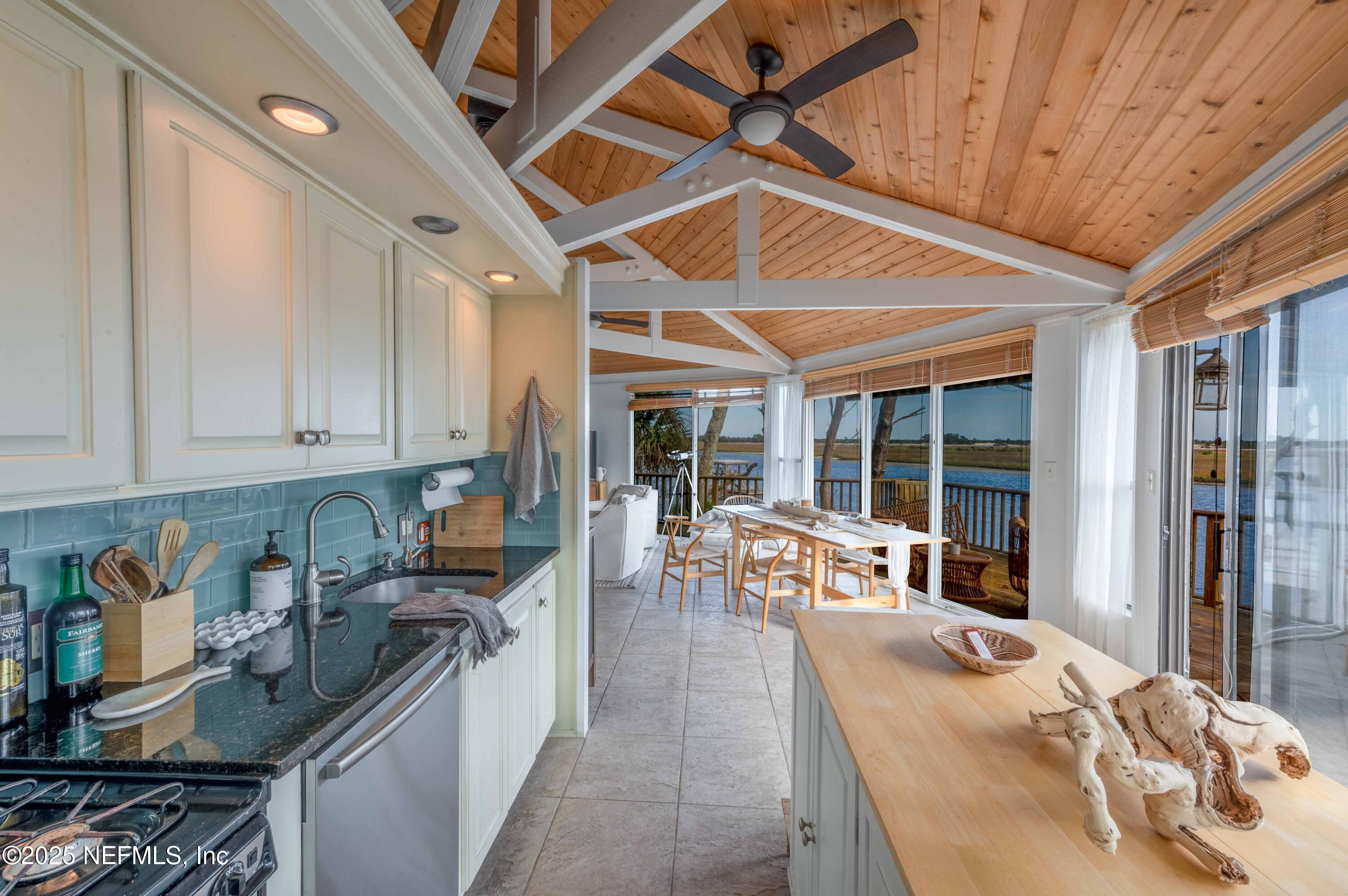 11255 Fort George Road Jacksonville, FL 32226 - Photo 27 of 38 a kitchen with granite countertop lots of counter top space