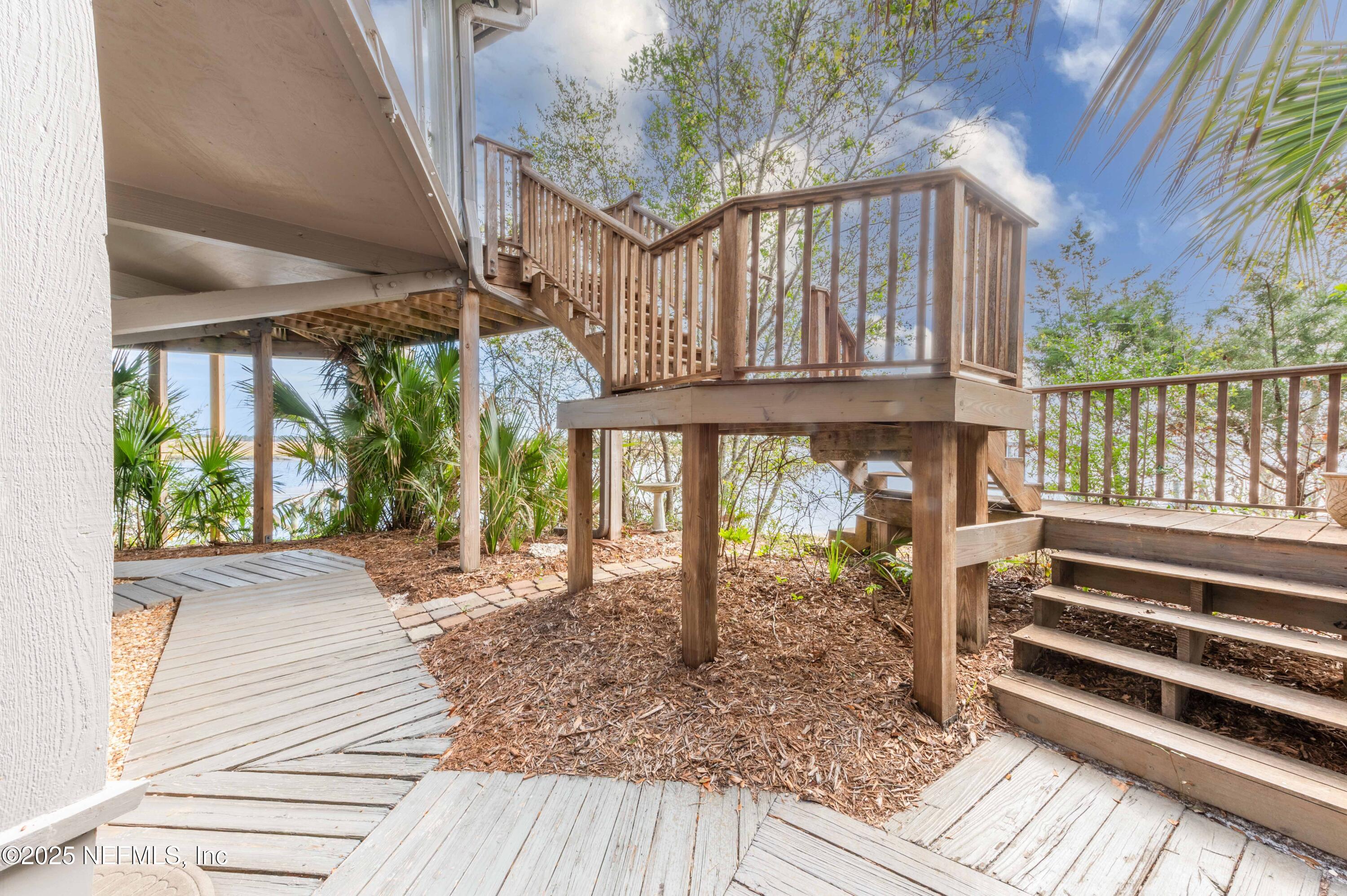 11255 Fort George Road Jacksonville, FL 32226 - Photo 7 of 38 a view of a house with a porch